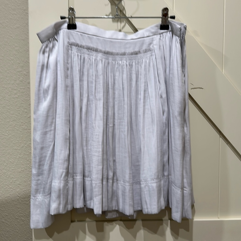 NWT Banana Republic silver skirt with zip on the side. Flat waist.